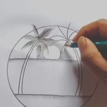 Mano che disegna un tramonto con palme dentro una cornice circolare