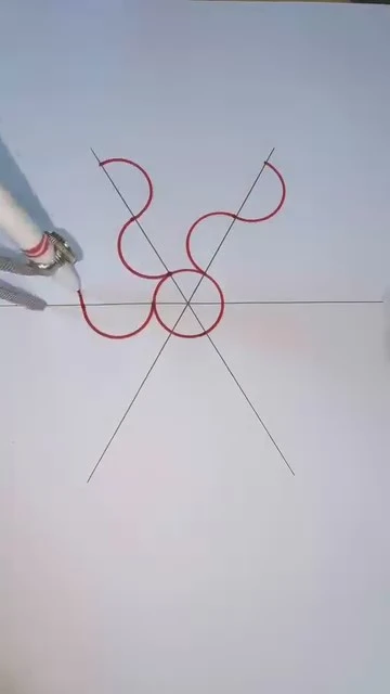 Disegno geometrico con compasso e linee curve rosse