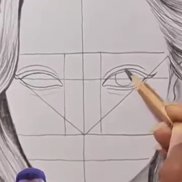 Disegno di un volto con linee guida per occhi, naso e bocca